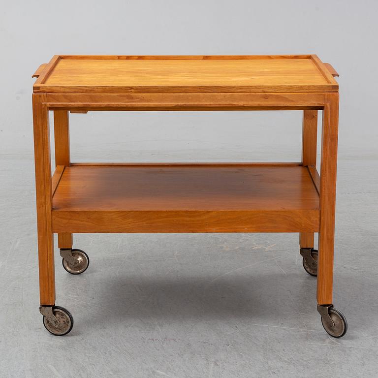 A 1930s/1940s elm veneered trolley.
