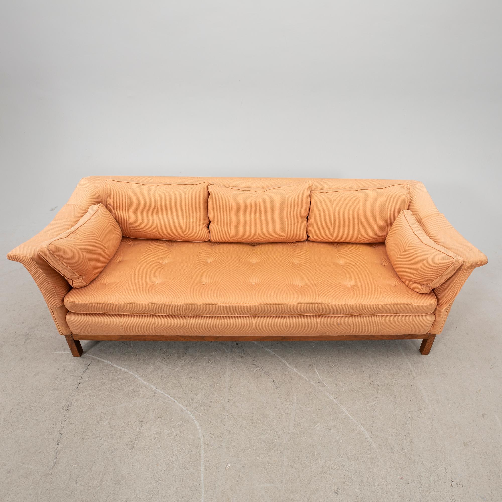 A 20th century three-seater sofa.