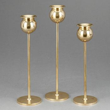 LJUSSTAKAR, 3 st, mässing, "Tulpan", Pierre Forsell, Skultuna, 1900-talets andra hälft.