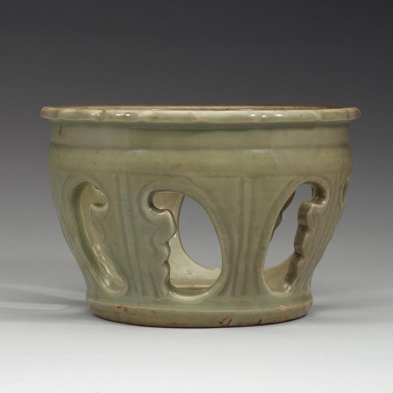 A Longquan celadon reticulated brazier stand, Ming dynasty (1368-1644).