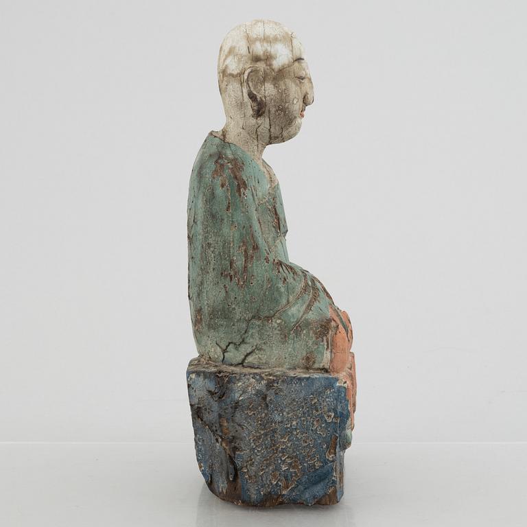 A Louhan, carved and painted wood, China, late Qing dynasty.