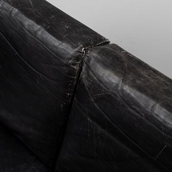 A 1960's leather covered sofa.