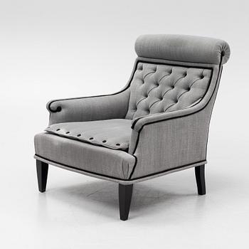 A contemporary easy chair.