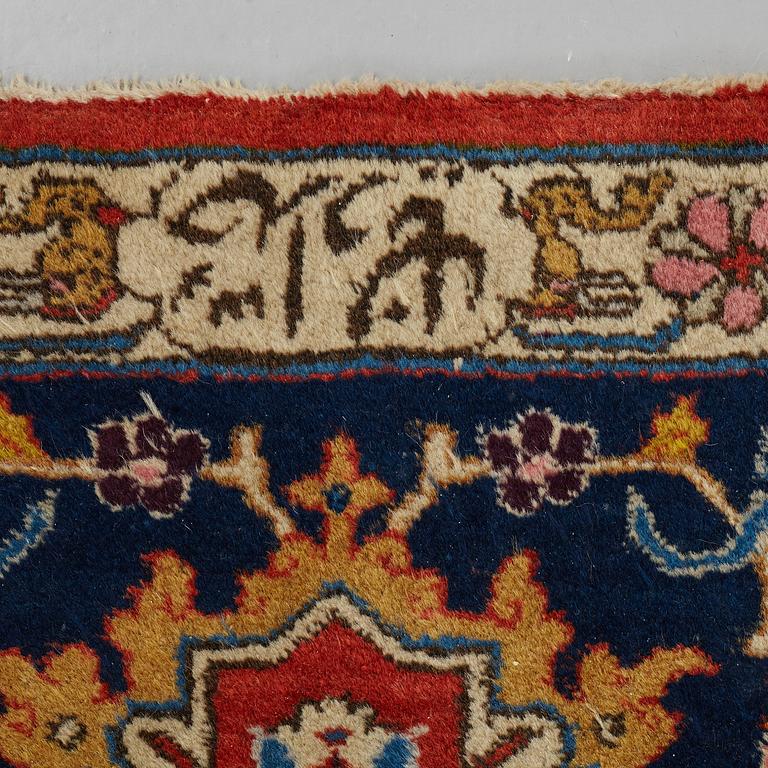 A CARPET, a semi-antique Tabriz, ca 342 x 269 cm.