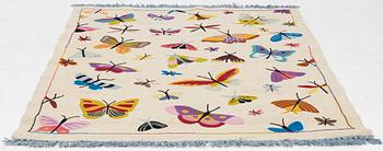 A hand-embroidered kilim carpet, c. 195 x 148 cm.
