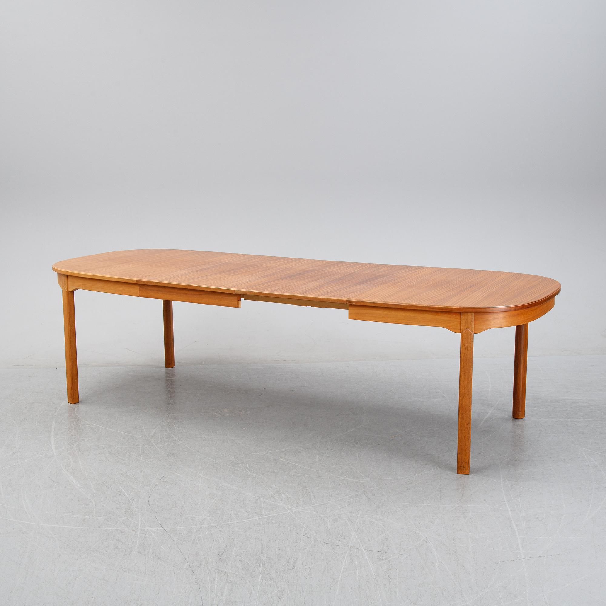 Carl Malmsten, a 'Ambassdör' walnut dining suite, Åfors Möbelfabrik.