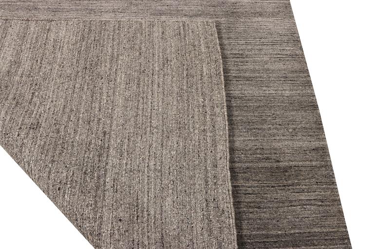 A rug, Lori, c. 242 x 121 cm.