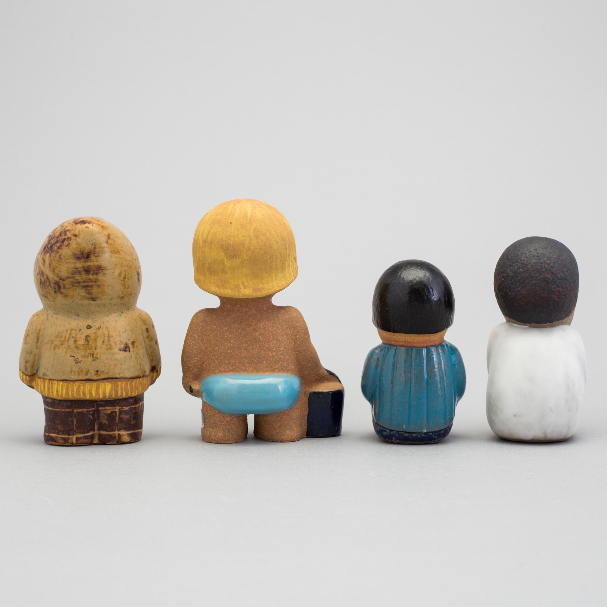 A set of eight stoneware sculptures " All världens barn"  by Lisa Larson, 1974-75.