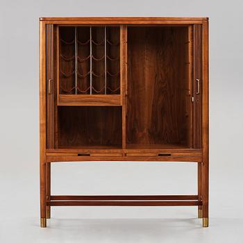 HANS J WEGNER, a bar cabinet executed by cabinetmaker Axel I Sørensen, for the Mayor's office, Aarhus City Hall,  1941.