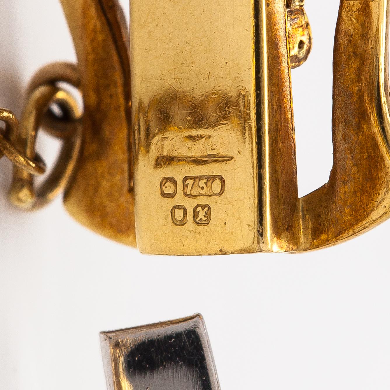 Armband, 18K guld och diamanter ca 0.56 ct totalt. Storbritannien.