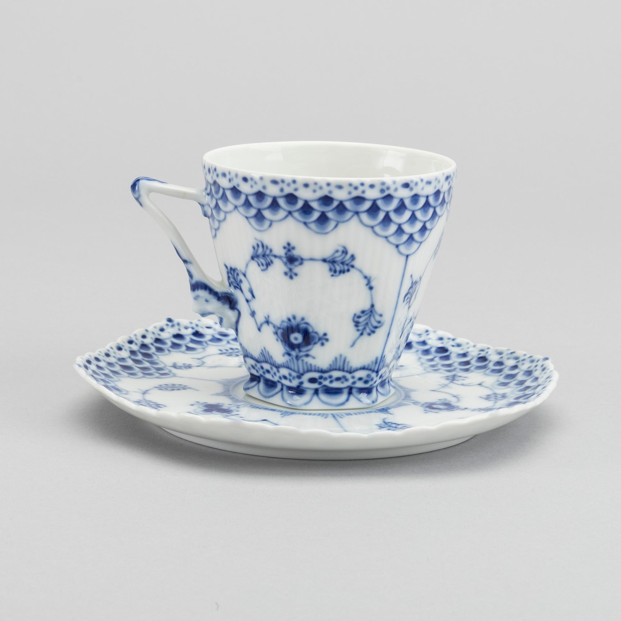 A set of 17 porcelain chocolat cups and saucers Musselmalet Royal Copenhagen Denmark.