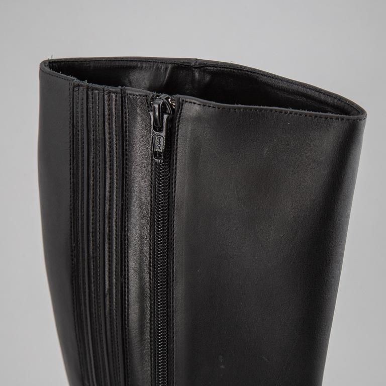 CHRISTIAN LOUBOUTIN, a pair of leather boots, size 37.