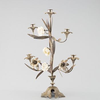 Three nickle-plated  candelabras, France, first half of the 20th century.