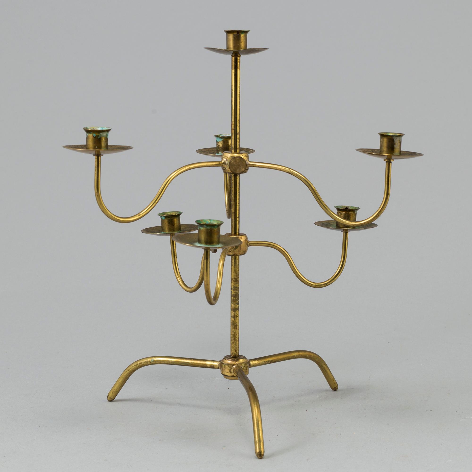 A brass kandelabra model 2454 by Josef  Frank for Firma Svenskt Tenn.