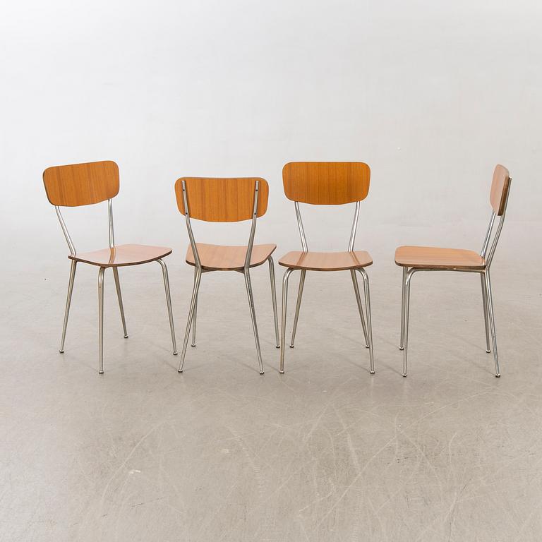 A Salvazini table and four chairs Italy 1950s.