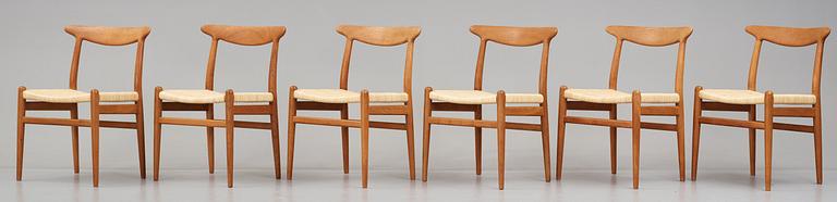 Hans J. Wegner, a set of 6 "W2" chairs, for C.M. Madsens Fabriker, Denmark 1950's.