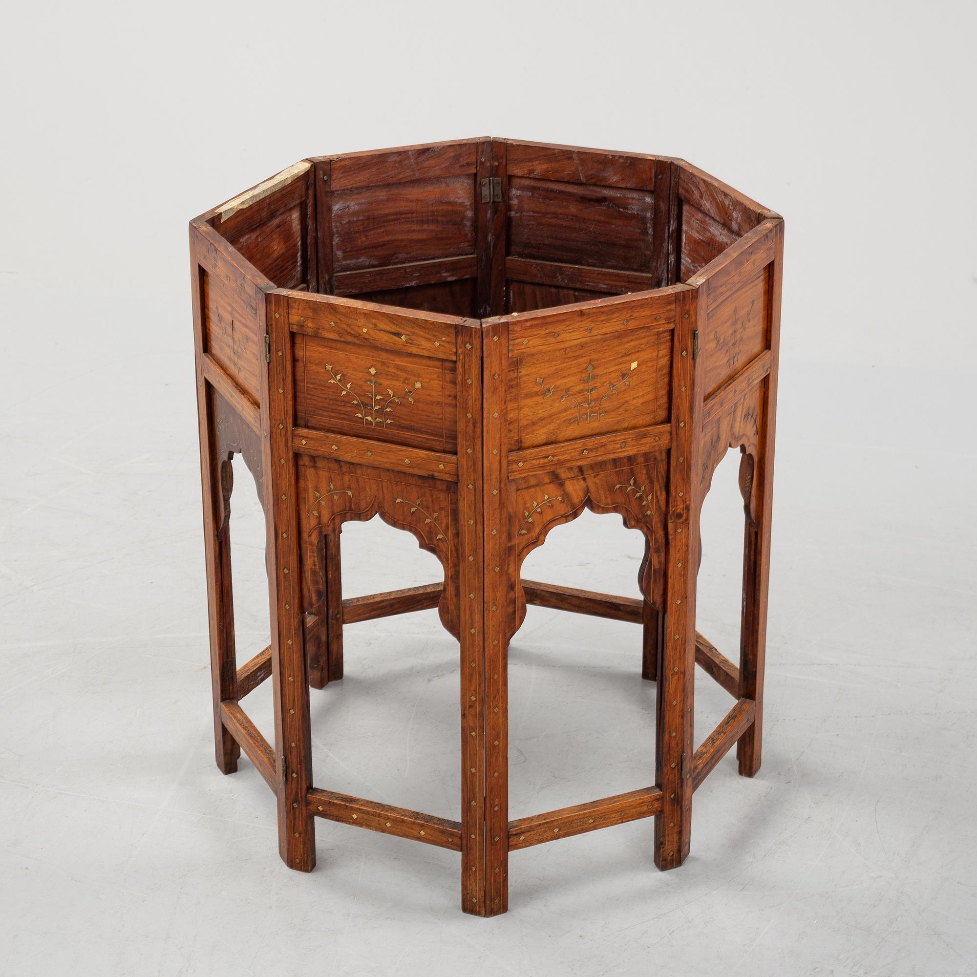 An Anglo Indian folding octagonal side table.