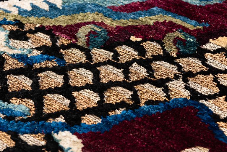 A Chinese silk and metal-thread 'Dragon' pillar rug, Bejing, North China, around 1910, c. 234x151 cm.