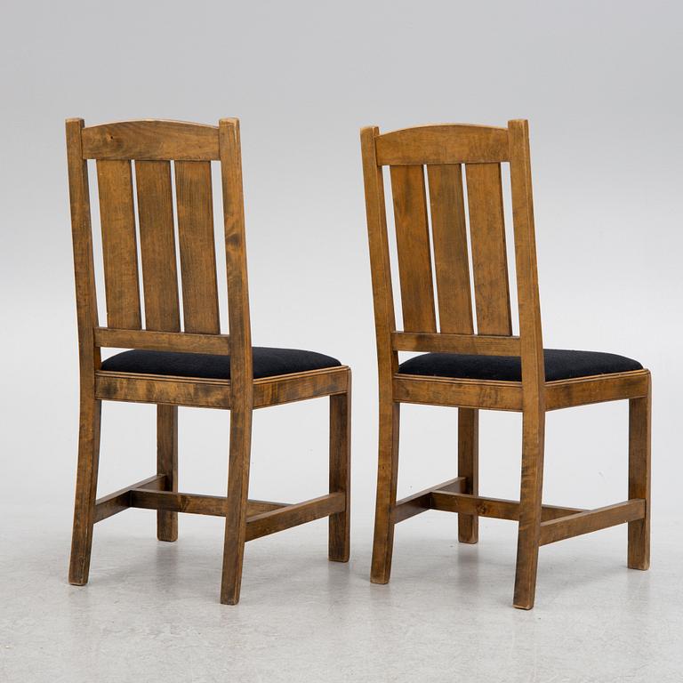 Carl Westman, attributed, a pair of stained birch wood chairs. Early 20th century.