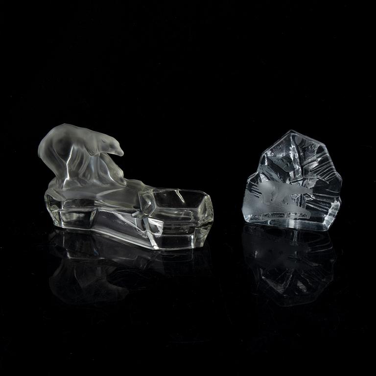 Nine glass polar bears.