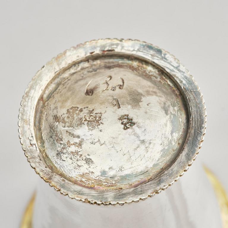 Three Swedish 18th century parcel-gilt silver beakers and a case of birch, different maker's.