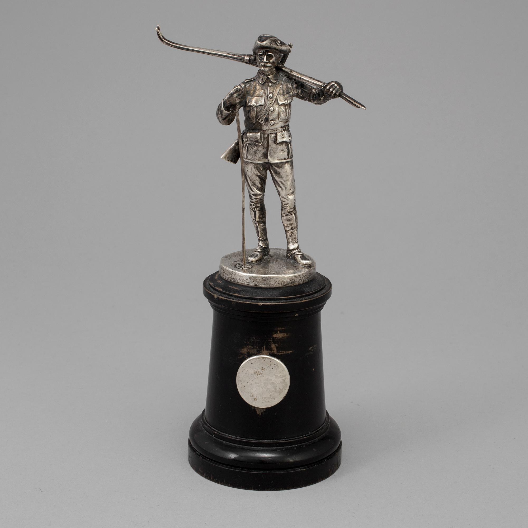 A Swedish silver figurine from CG Hallberg in Stockholm with unclear hallmarks.