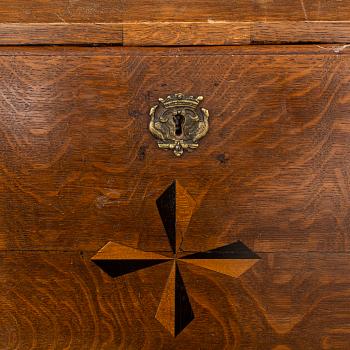 A mid 18th century oak secretaire.