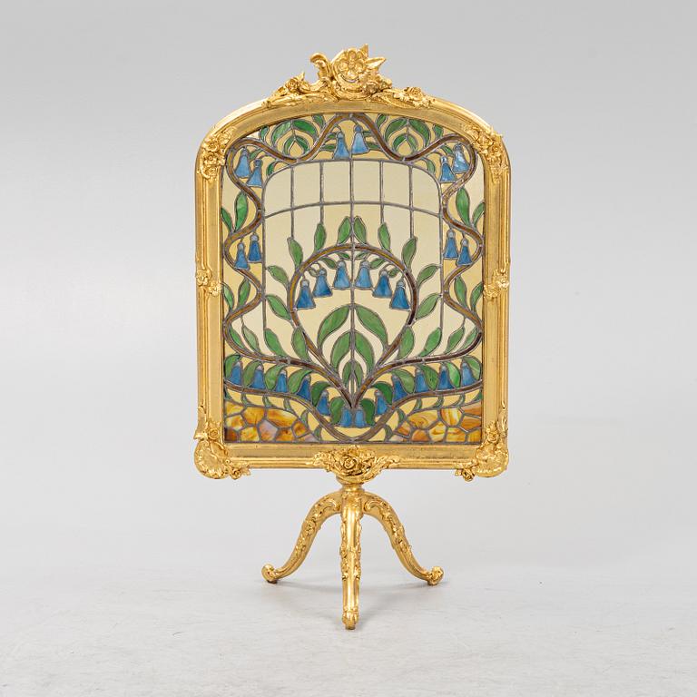 Brasskydd, Louis XV-stil, 1900-tal.