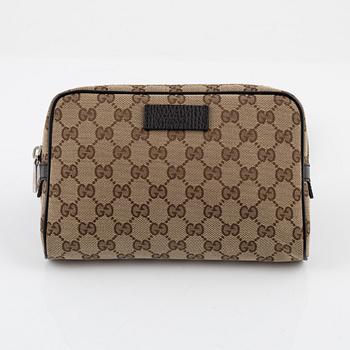 Gucci, a belt bag.