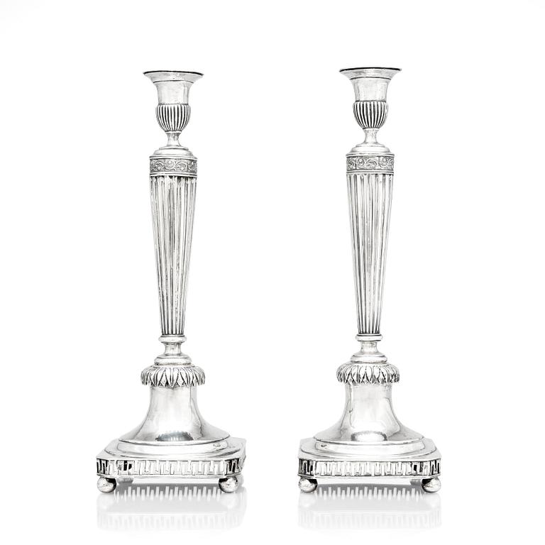 A pair of Swedish early 19th century silver candelsticks, mark of Jacob Hallardt, Stockholm 1811.