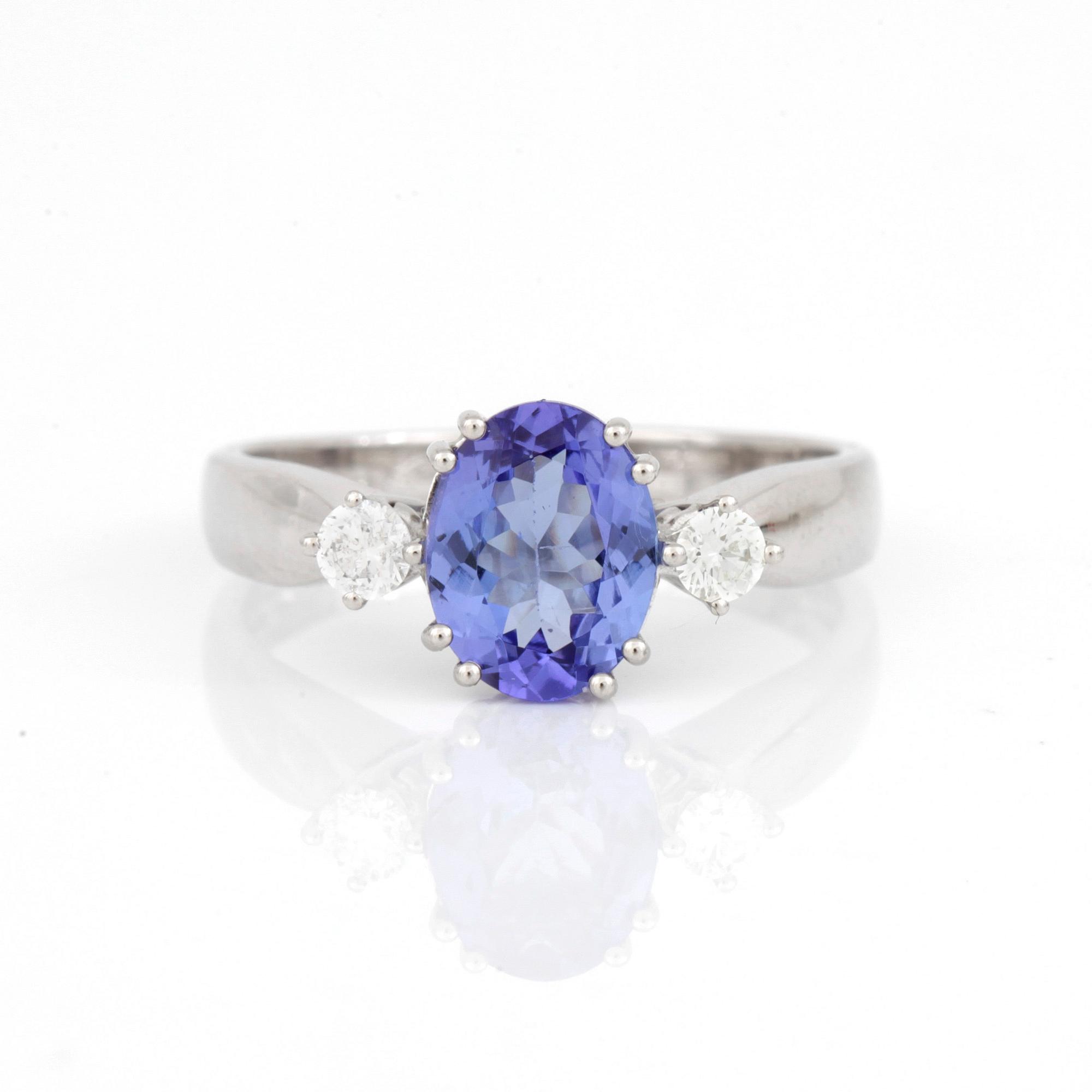 RING, 18K vitguld med tanzanit ca 1.58 ct och briljantslipade diamanter totalt ca 0.20 ct. Total vikt ca 4,50 gram.