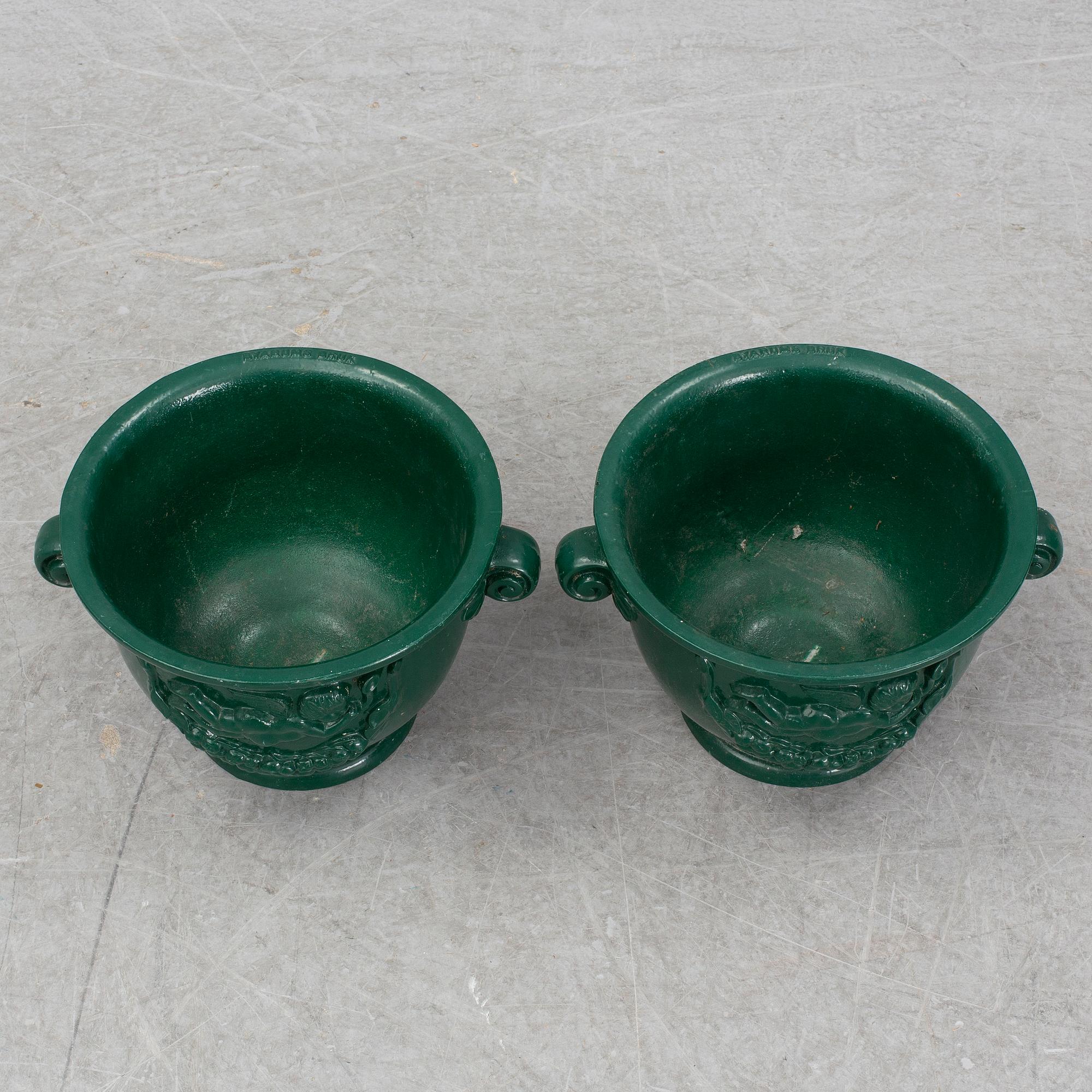 A pair of aluminum garden vases, Byarum.