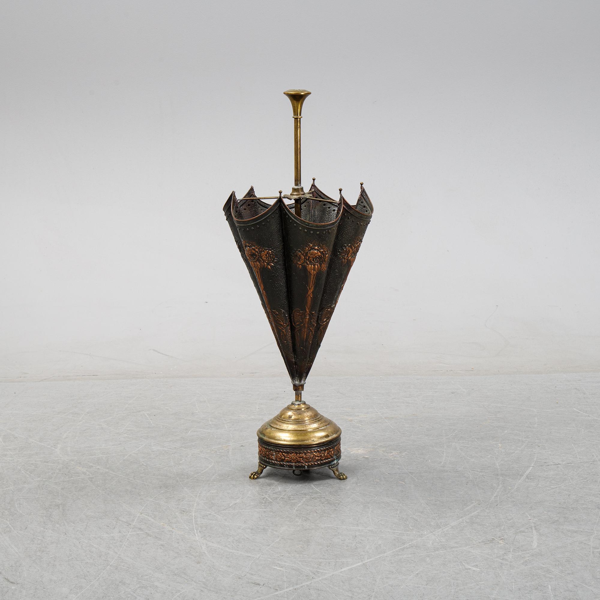 A brass and copper umbrella stand, first half of the 20th Century.