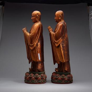 Two gilt lacquered figures of lamas, Ming dynasty (1368-1644).