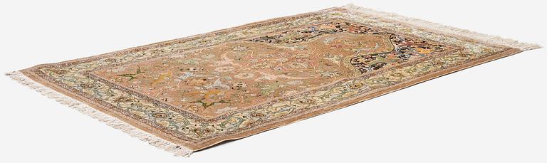 A semi-antique Hereke souf, silk and metal thread rug, West Anatolia, c. 163 x 103 cm.