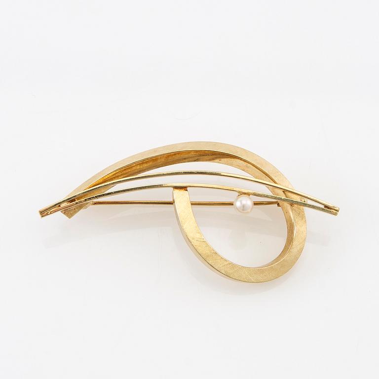 Brosch 14K guld med en odlad pärla.