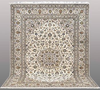 A Keshan carpet, approx. 353 x 251 cm.