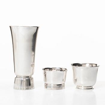 A silver vase and two bowls, Jacob Ängman, Eric Löfman, and Borgila respectively.