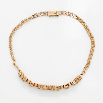 A 14K gold bracelet with diamonds ca. 1.50 ct in total.