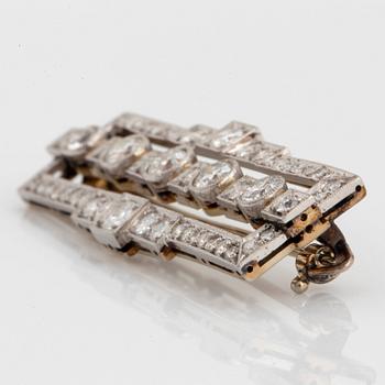 A platinum and gold brooch set with old- and eight-cut diamonds with a total weight of ca 2.00 cts.