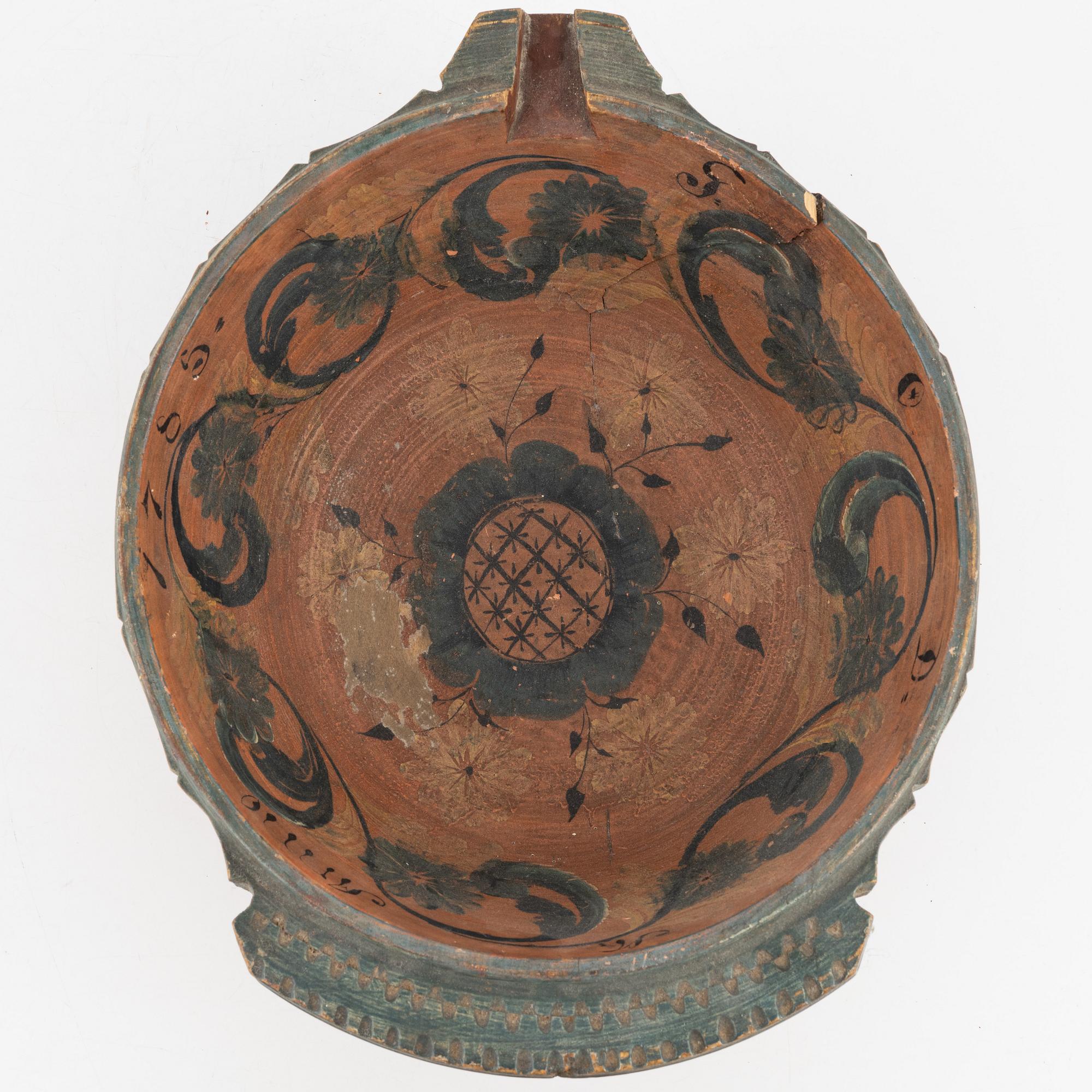 A lathed and painted bowl dated 1783.