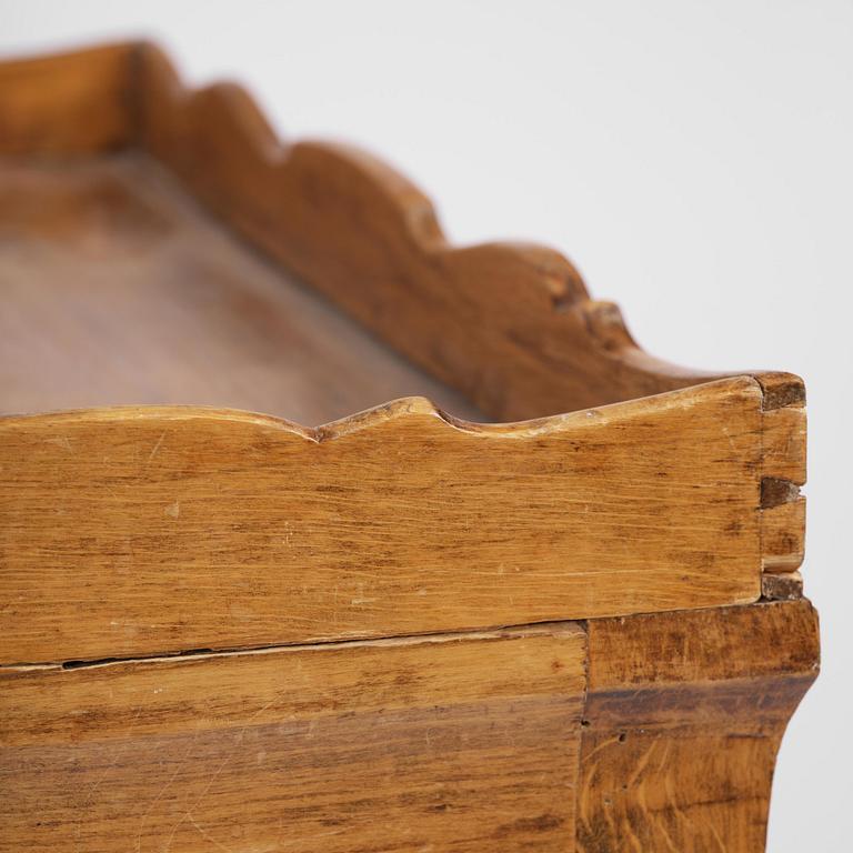 A Swedish rococo chamberpot cupboard, later part 18th century.