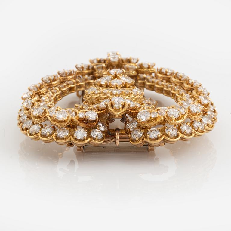 Van Cleef & Arpels brosch/hänge 18K guld med runda briljantslipade diamanter.