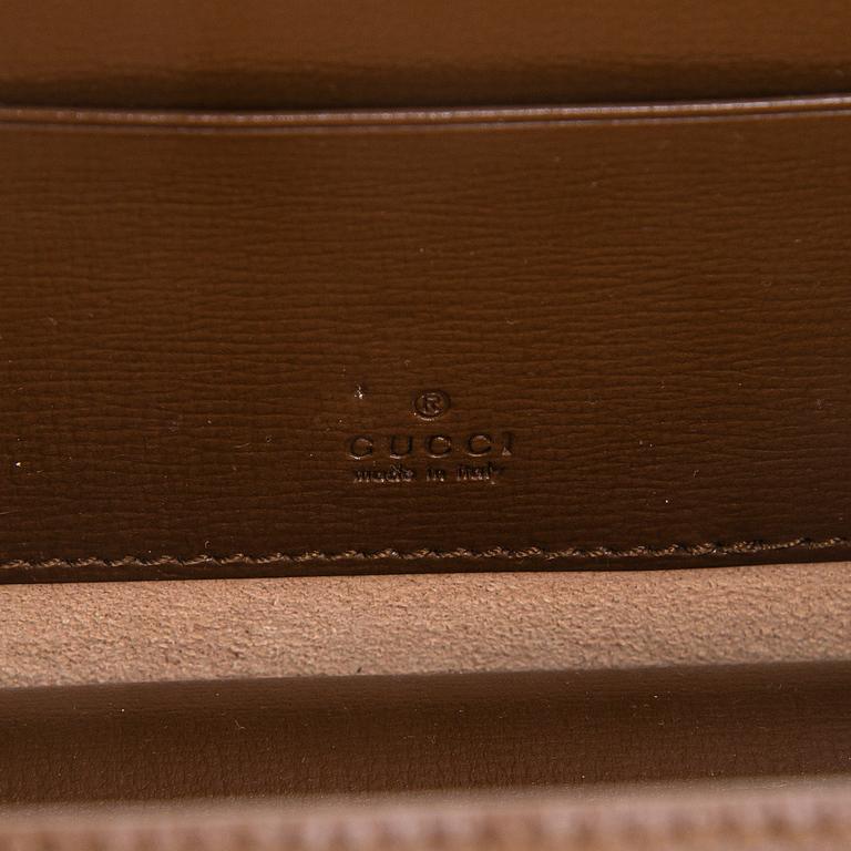 Gucci, "GG Supreme" laukku.
