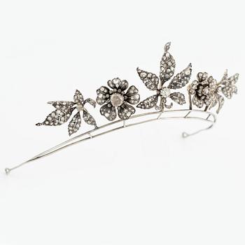 A silver and gold tiara with old-cut and rose-cut diamonds.