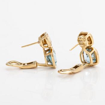 Cassandra Goad, a pair of 18K gold earrings with topazes and citrines. London.