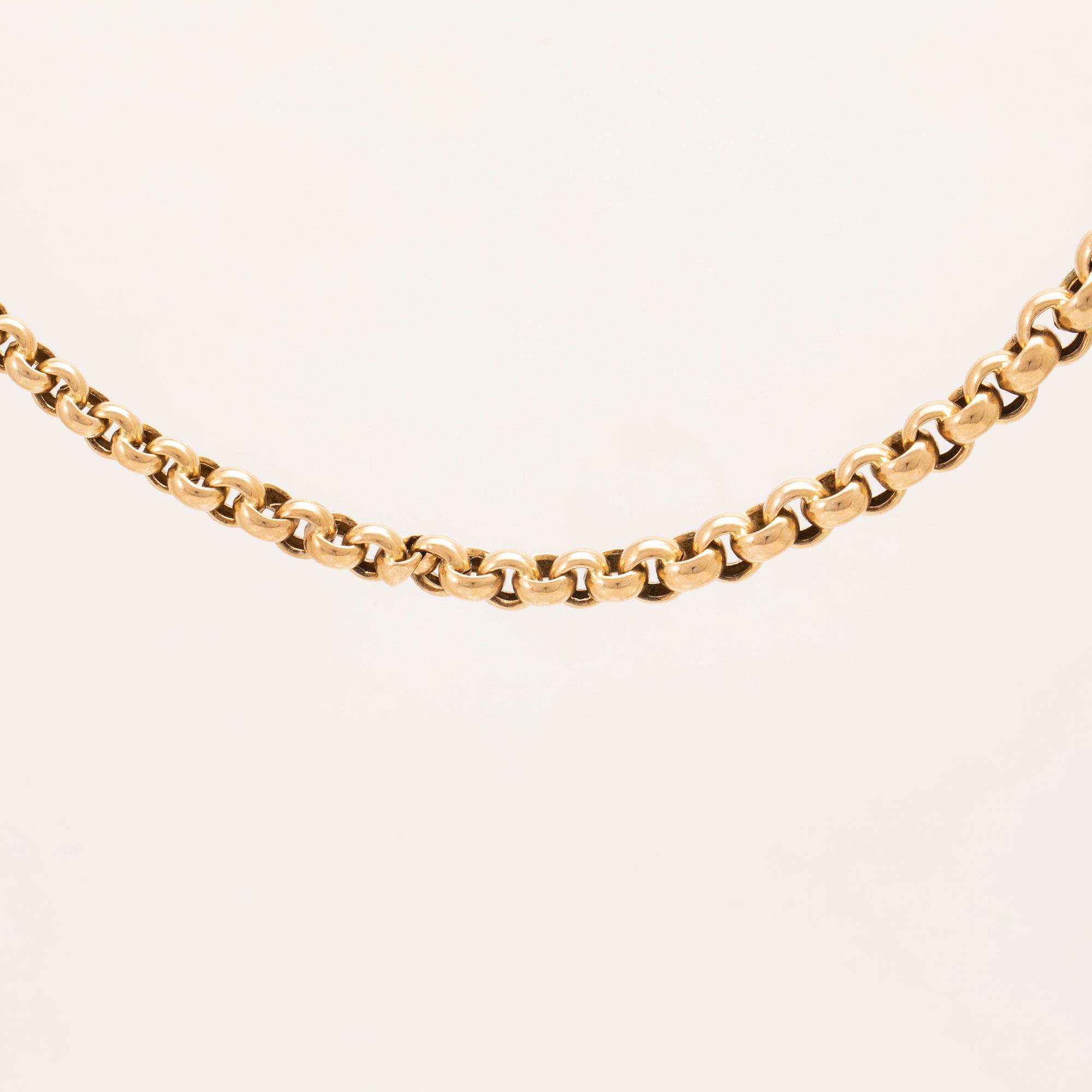 An 18K pocket watch chain.