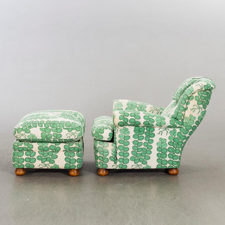 A model 336 easy chair with stool by Josef Frank for Firma Svenskt Tenn, Sweden.