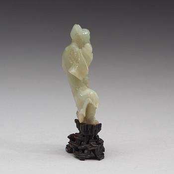 A nephrite sculpture of a man, Qing dynasty (1644-1912).