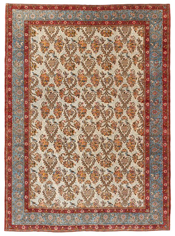 A semi-antique Kashan carpet. 323 x 237 cm.